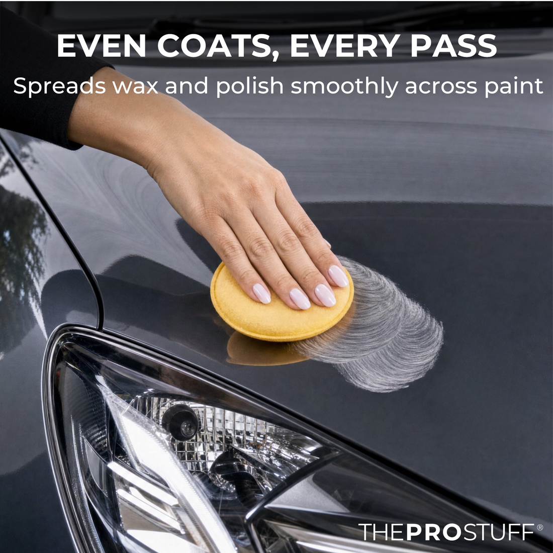 Hand spreading wax on car paint with a Soft Applicator Foam pad for even coats