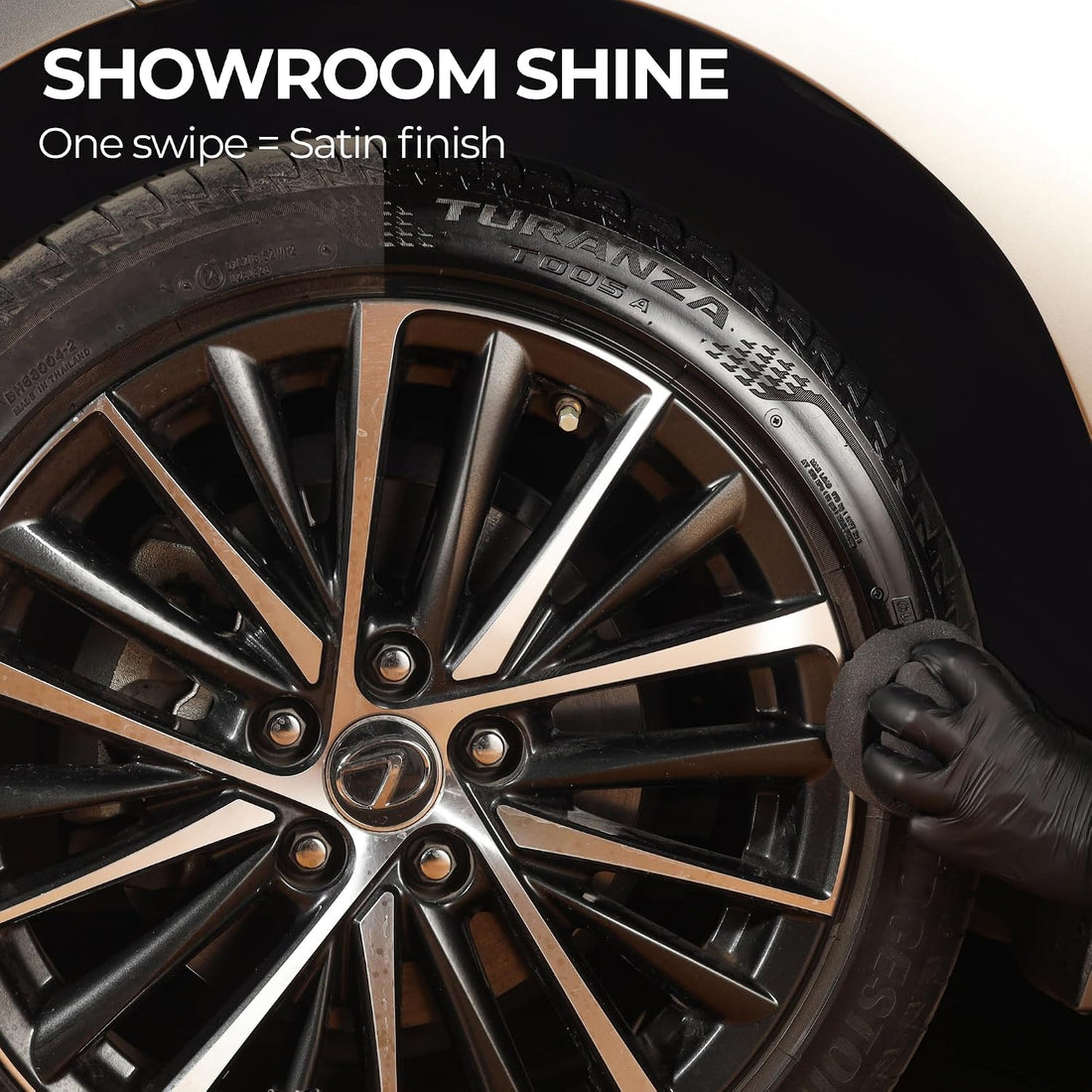 Gloved hand applying tire shine to a sidewall with the Tire Shine Applicator for a satin finish