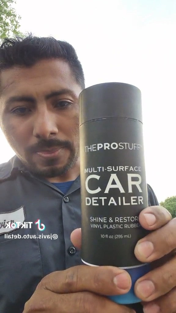 Detailer holding The Pro Stuff Multi-Surface Car Detailer